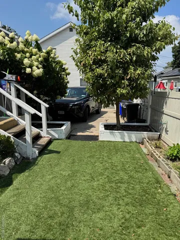a car parked in front of a house