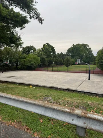a view of a car in front of a building