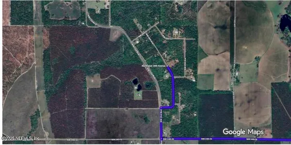 an aerial view of house with outdoor space