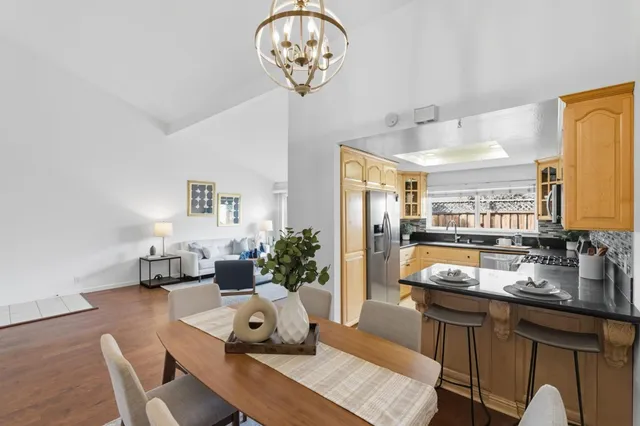 a very nice looking dining room with furniture