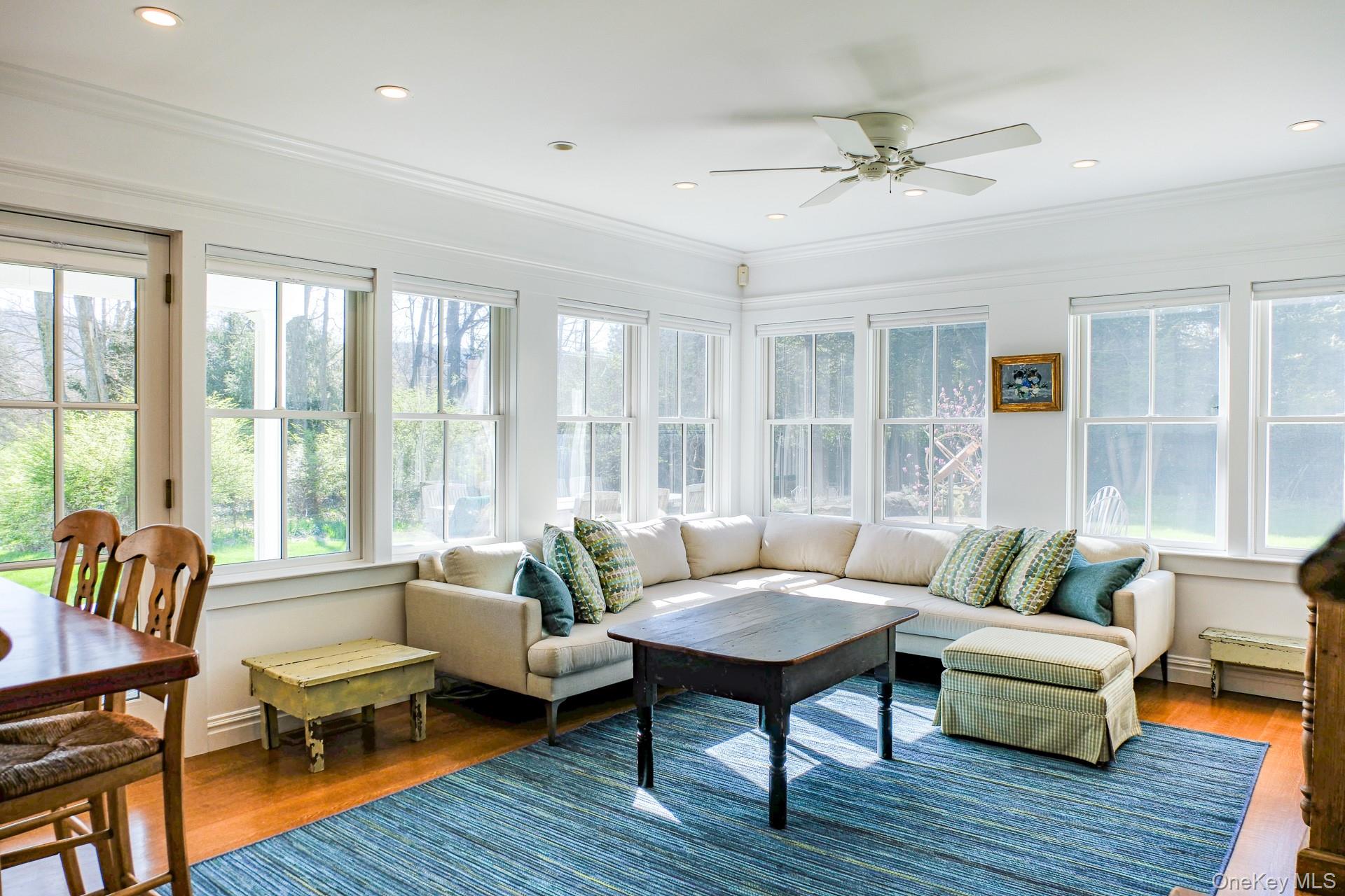 151 Benson Hill Road Wassaic, NY 12592 - Photo 14 of 45 a living room with furniture and a large window
