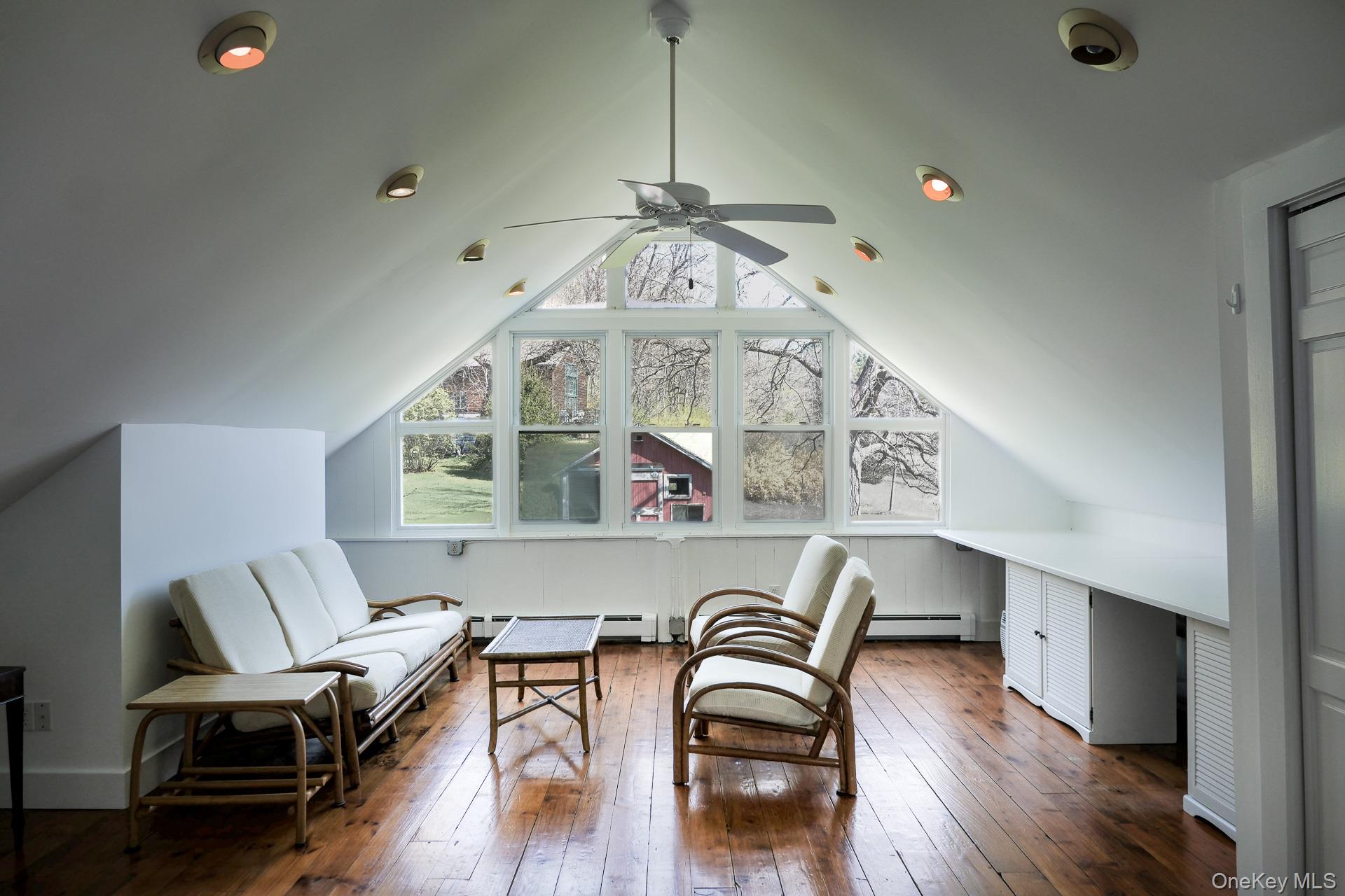 151 Benson Hill Road Wassaic, NY 12592 - Photo 29 of 45 a view of a dining room with furniture wooden floor and chandelier