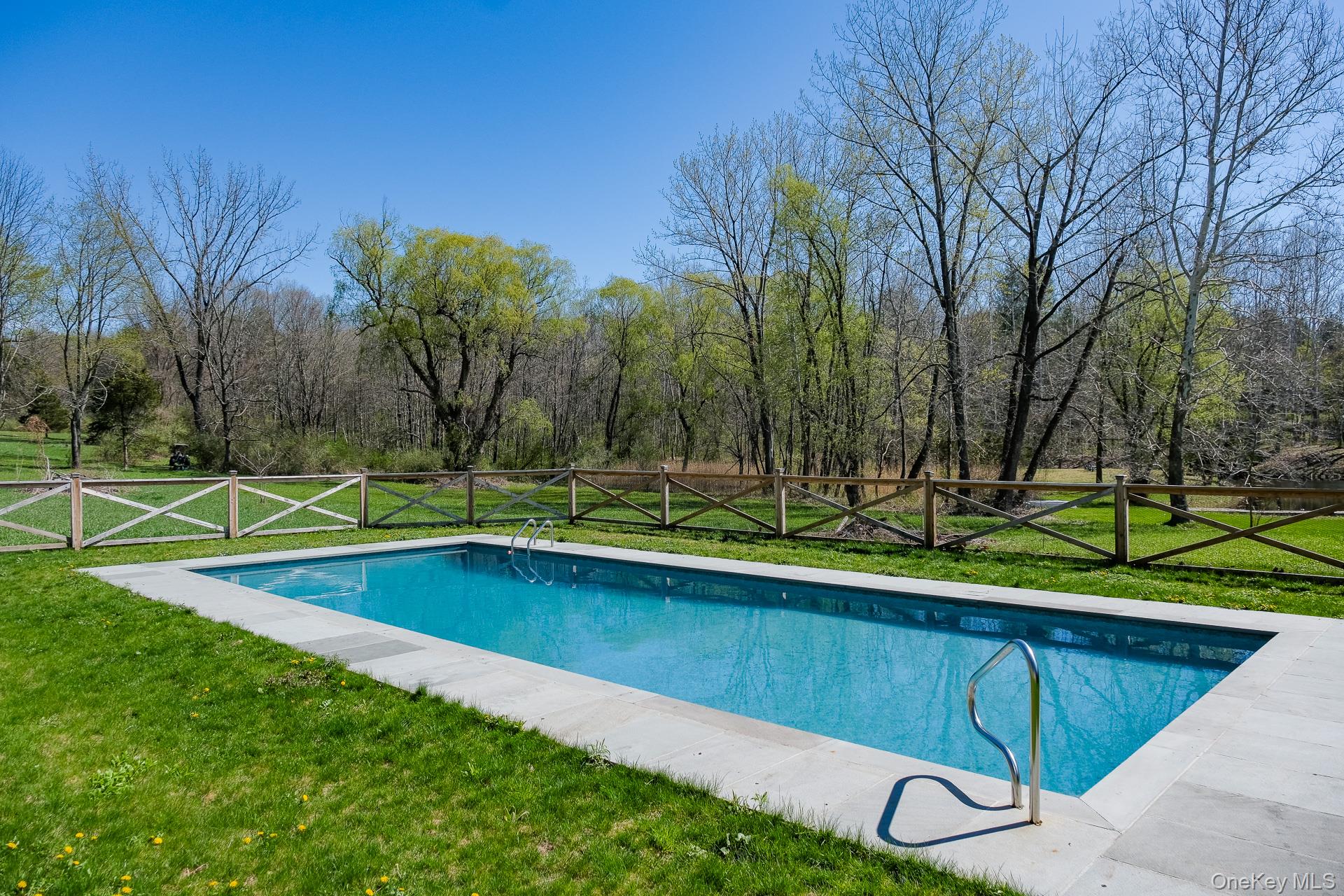 151 Benson Hill Road Wassaic, NY 12592 - Photo 9 of 45 a view of a backyard with swimming pool and sitting area