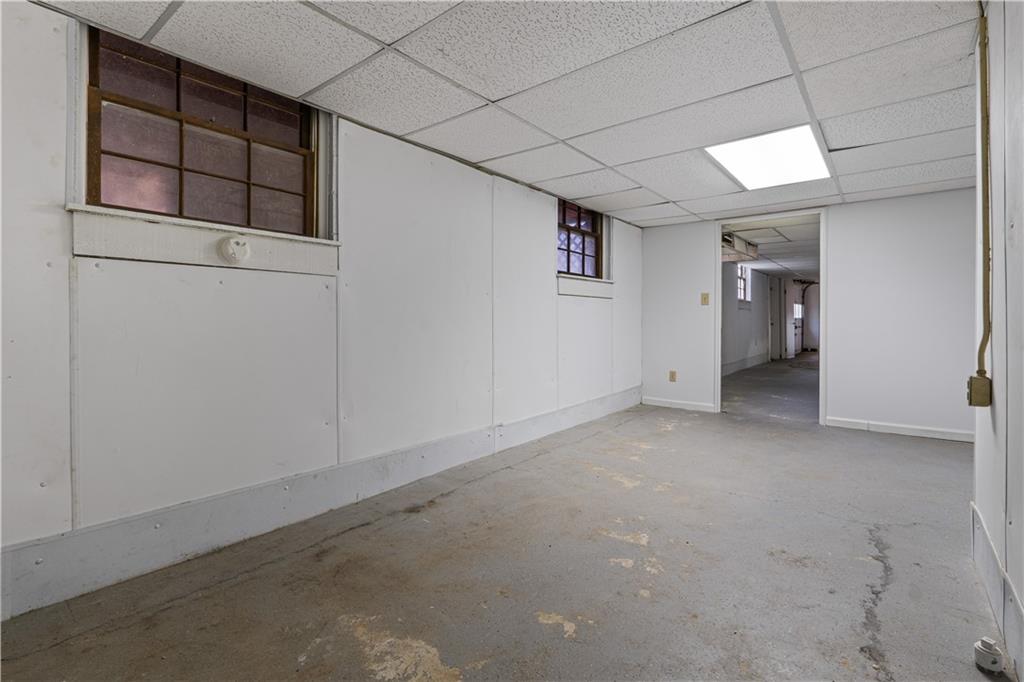 7085 Hobgood Road Fairburn, GA 30213 - Photo 33 of 40 a view of an empty room with a window