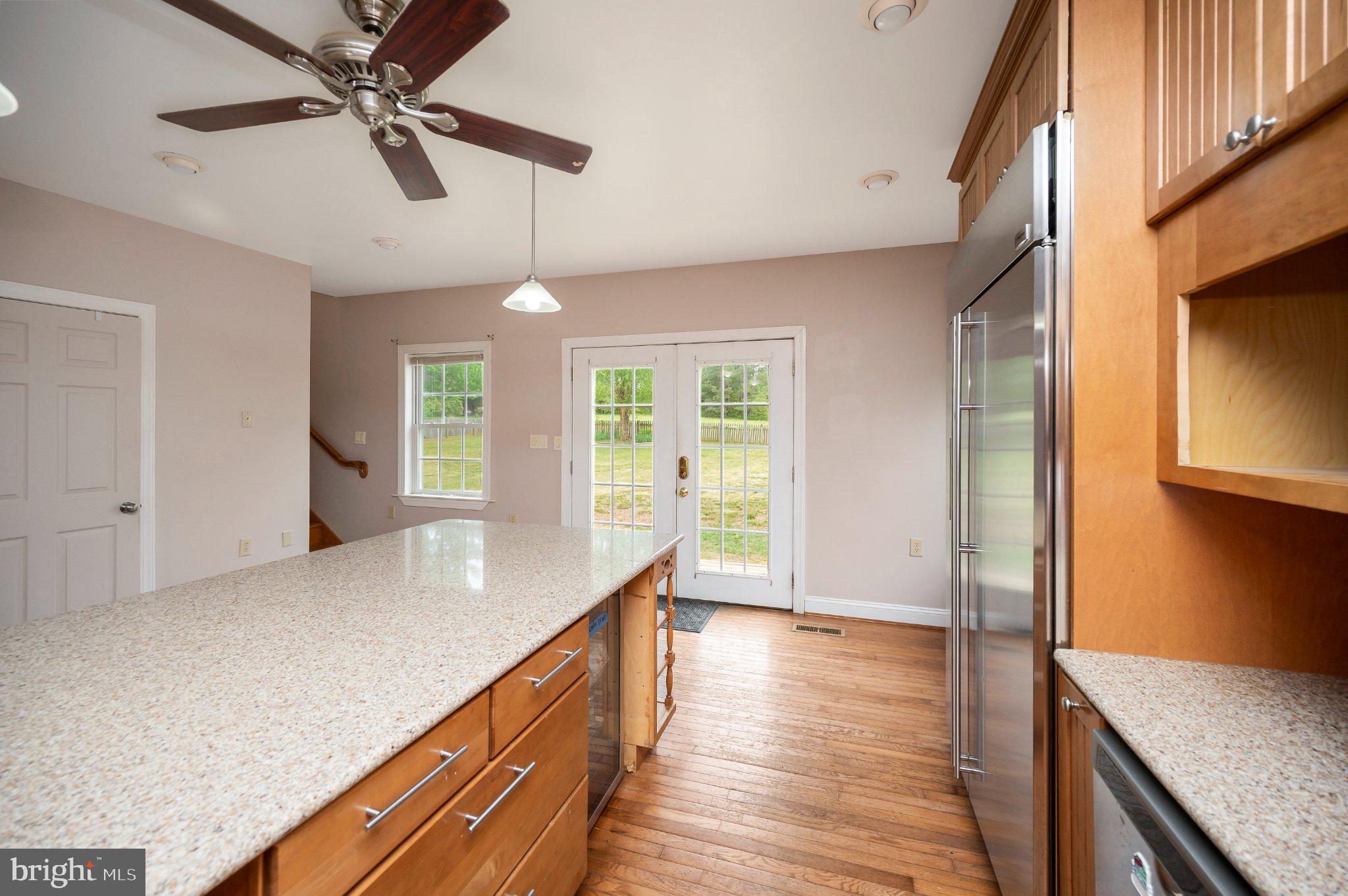 23202 Village Road Unionville, VA 22567 - Photo 26 of 58 a view of hallway with wooden floor and cabinet