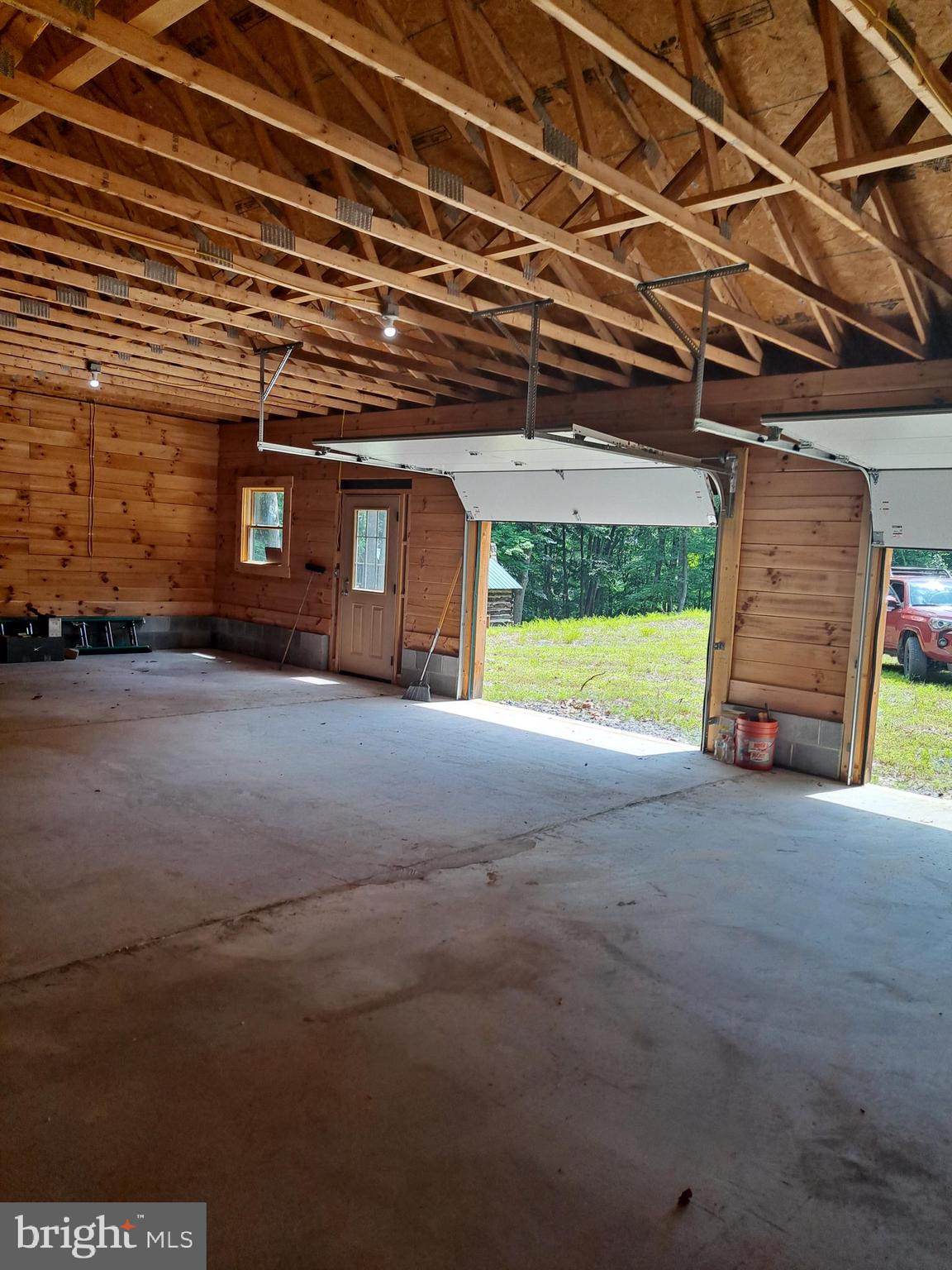 1079 Little Mountain Road Cabins, WV 26855 - Photo 12 of 50 a view of a room with wooden walls