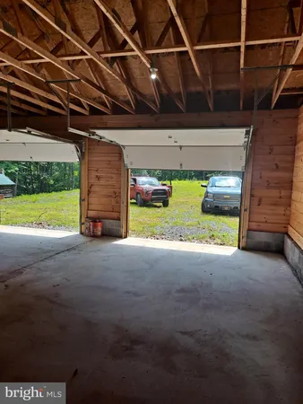 a view of a room with a garage
