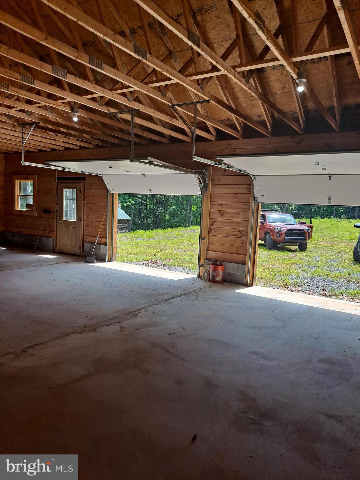 1079 Little Mountain Road Cabins, WV 26855 - Photo 14 of 50 a view of a room with wooden walls