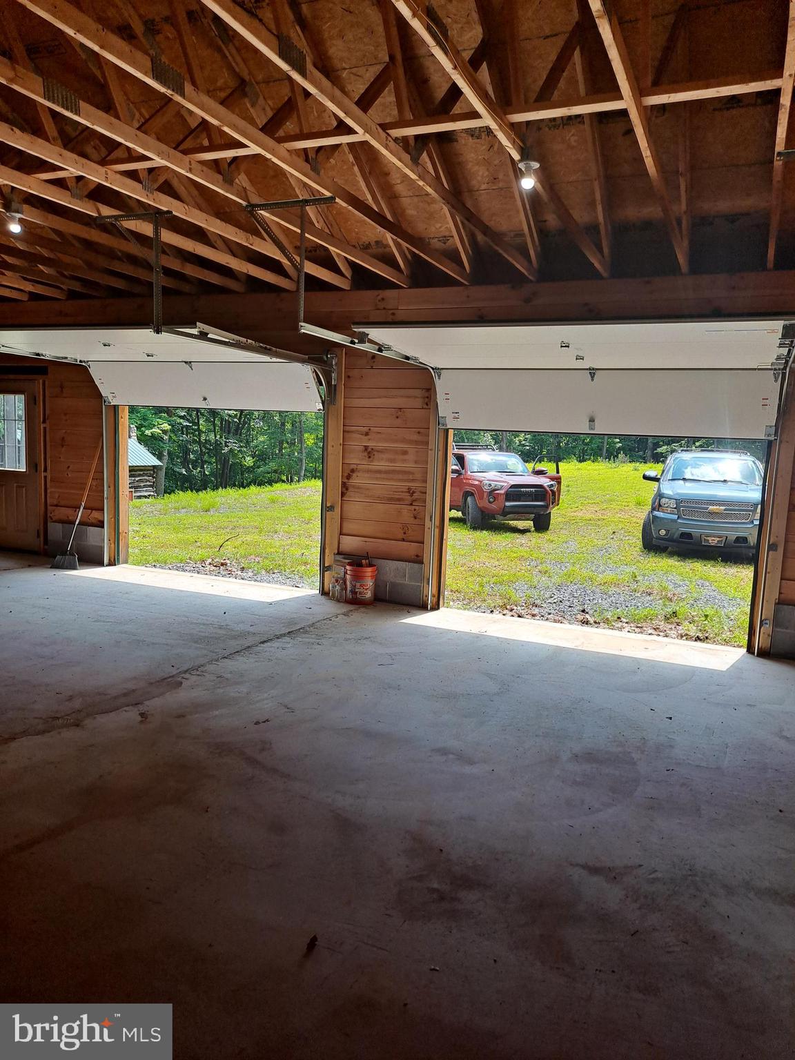 1079 Little Mountain Road Cabins, WV 26855 - Photo 15 of 50 a view of an empty room with a garage