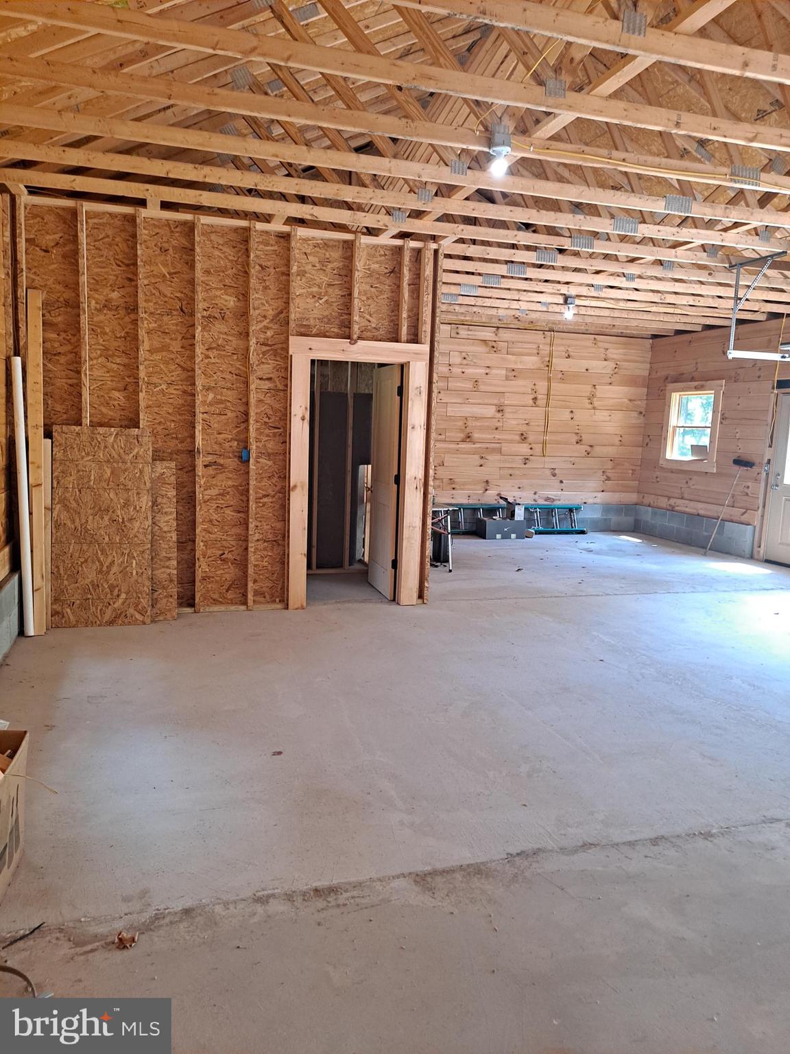 1079 Little Mountain Road Cabins, WV 26855 - Photo 16 of 50 a view of an empty room with a fireplace