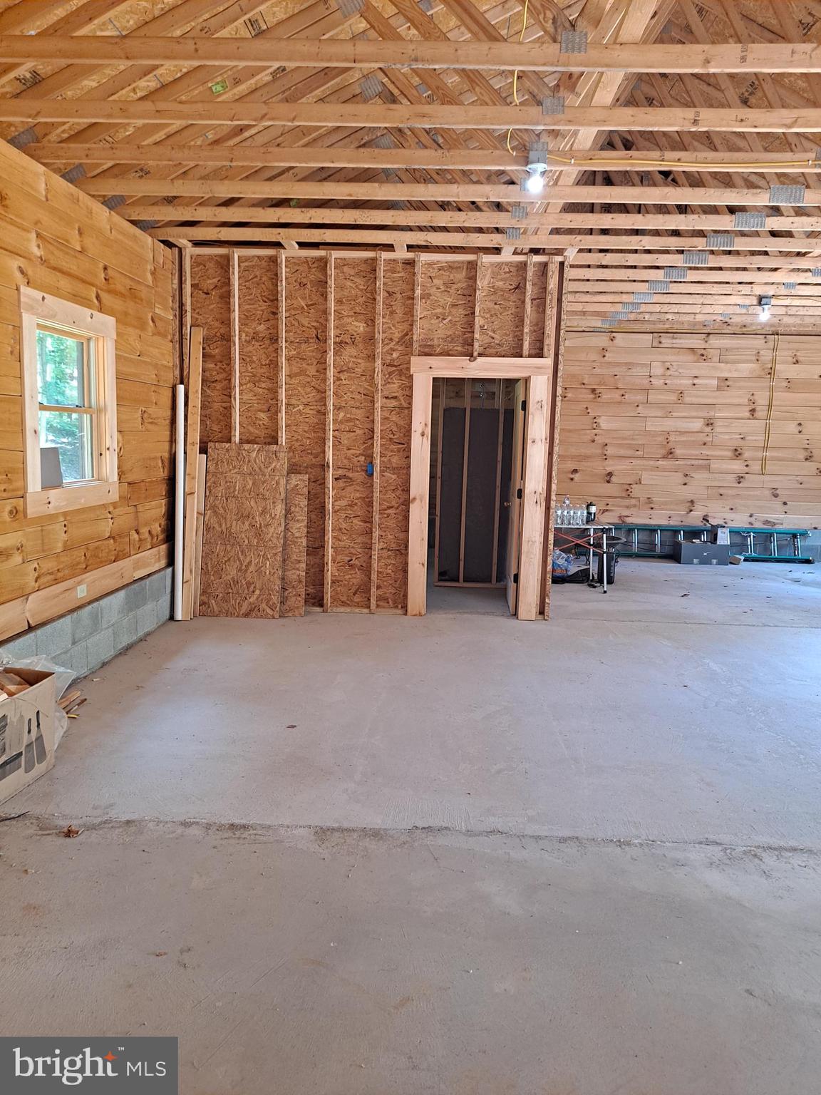 1079 Little Mountain Road Cabins, WV 26855 - Photo 20 of 50 a view of an empty room with a fireplace