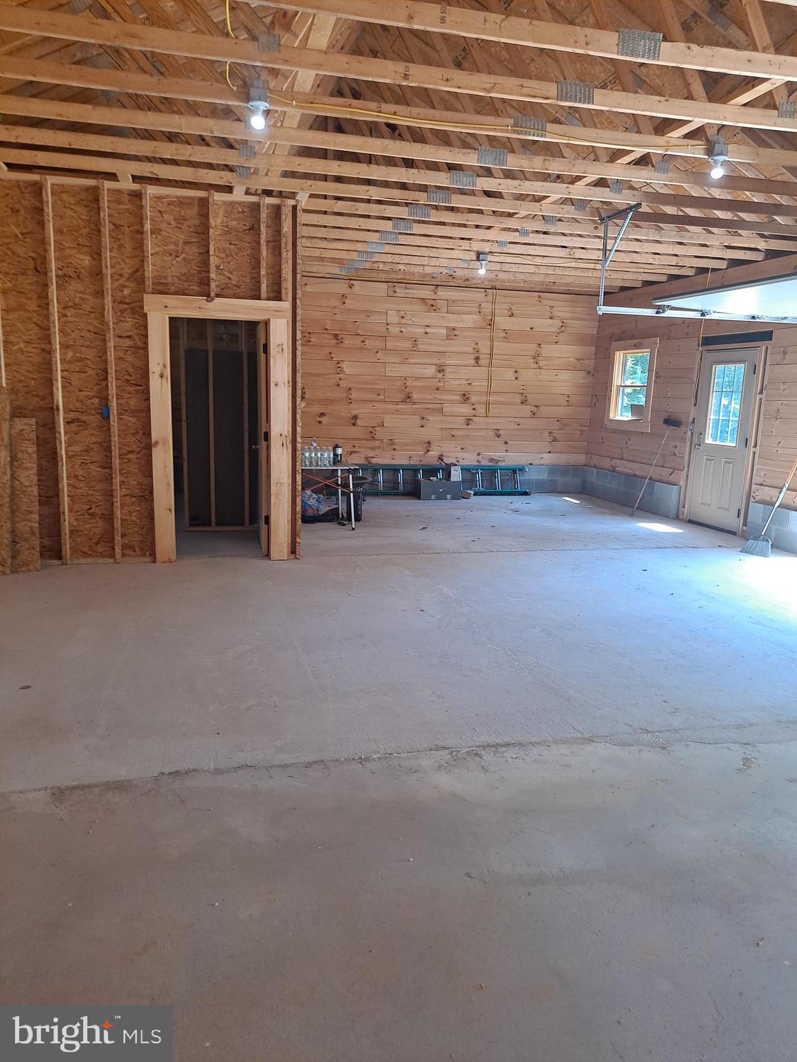 1079 Little Mountain Road Cabins, WV 26855 - Photo 21 of 50 a view of an empty room with a fireplace