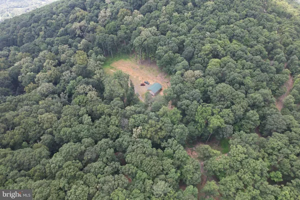 a view of outdoor space with deck and backyard