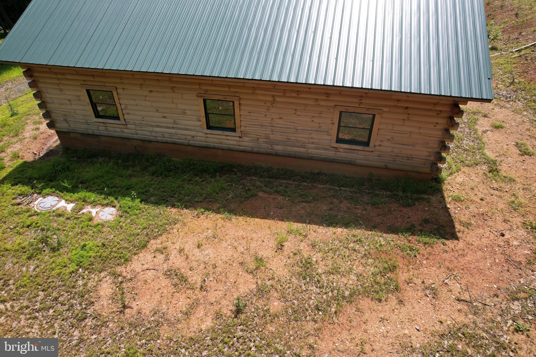 1079 Little Mountain Road Cabins, WV 26855 - Photo 6 of 50 a backyard of a house
