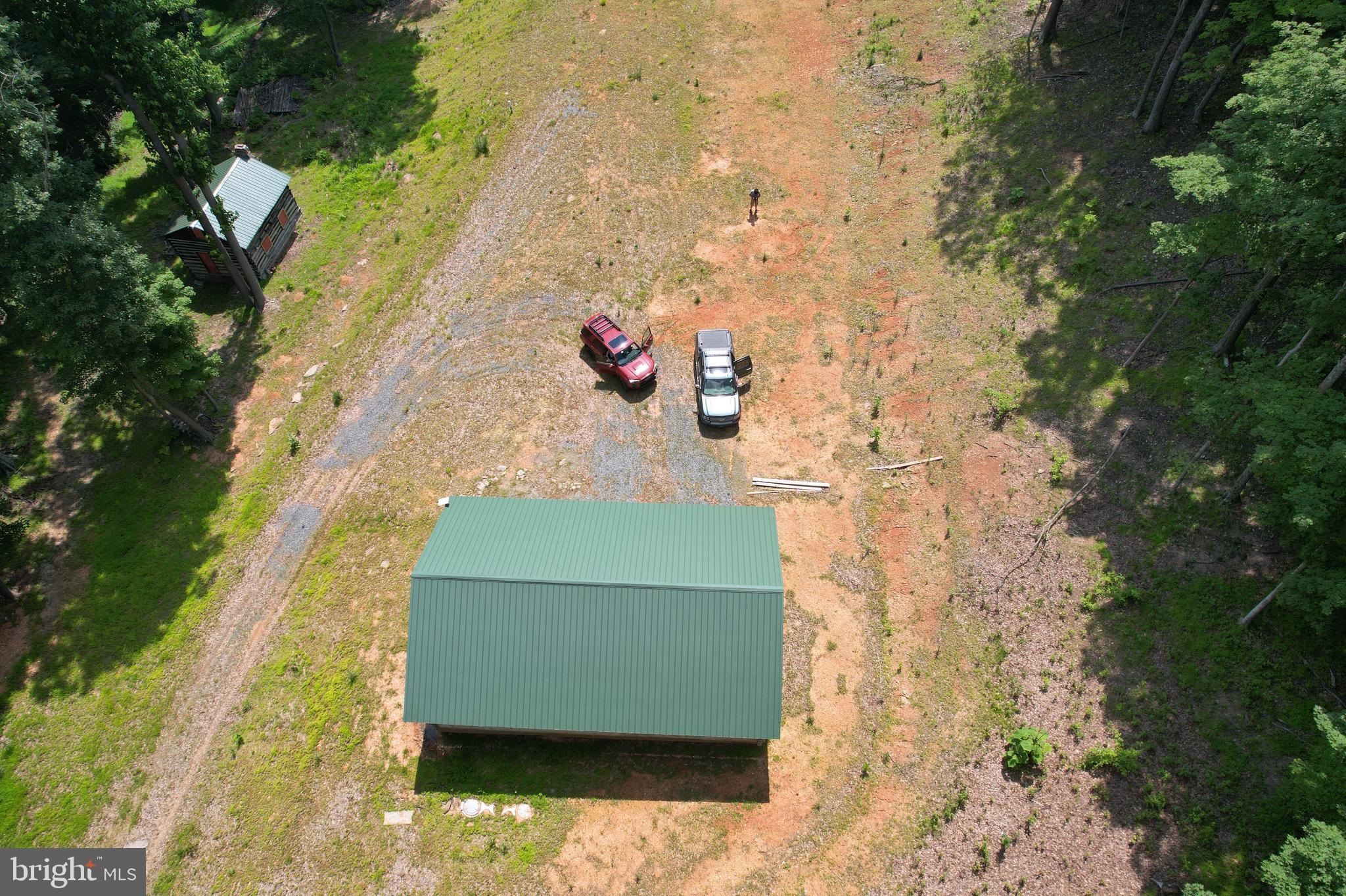 1079 Little Mountain Road Cabins, WV 26855 - Photo 8 of 50 an aerial view of a house with a yard