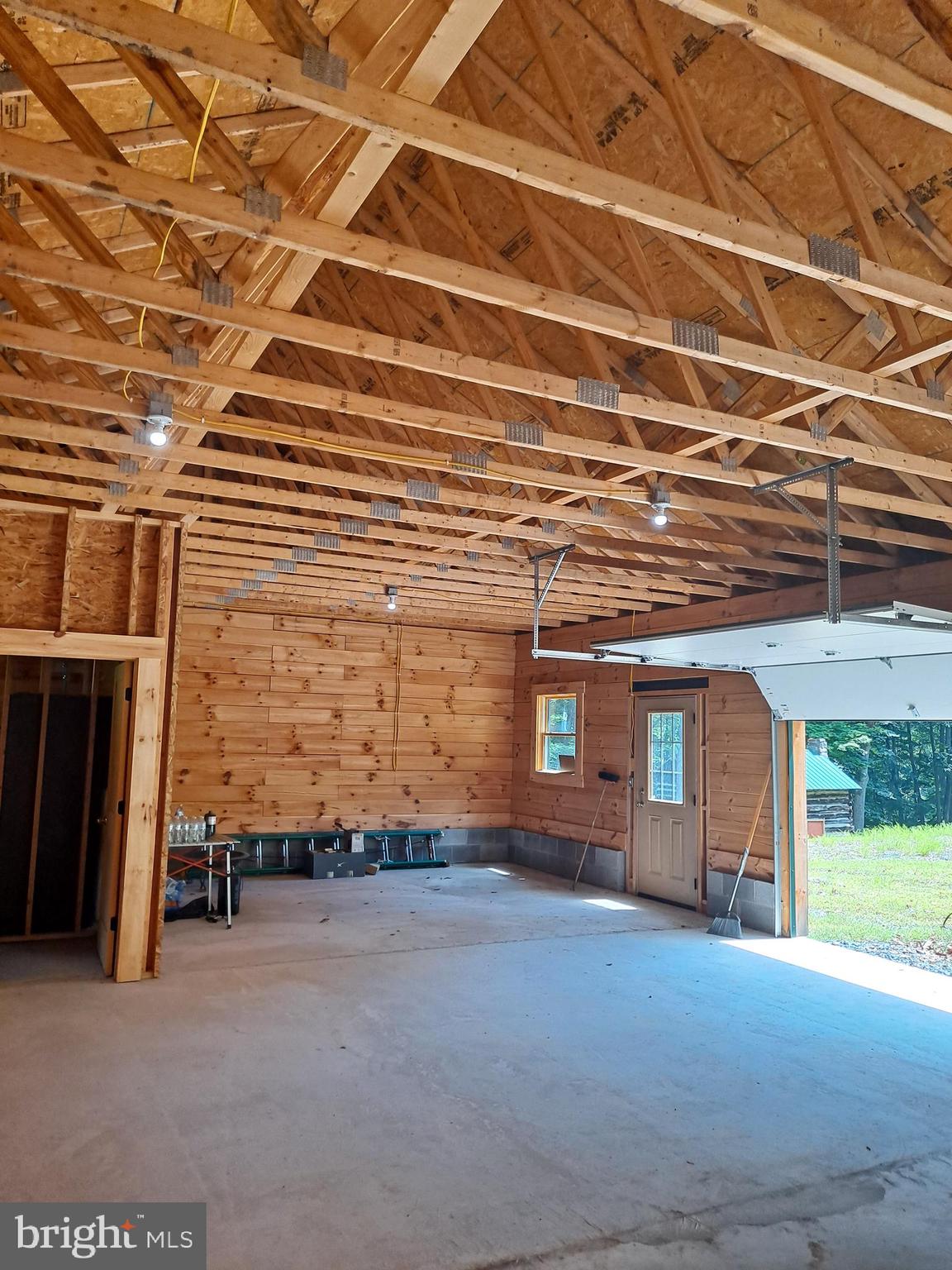 1079 Little Mountain Road Cabins, WV 26855 - Photo 10 of 50 a view of an empty room with a fireplace