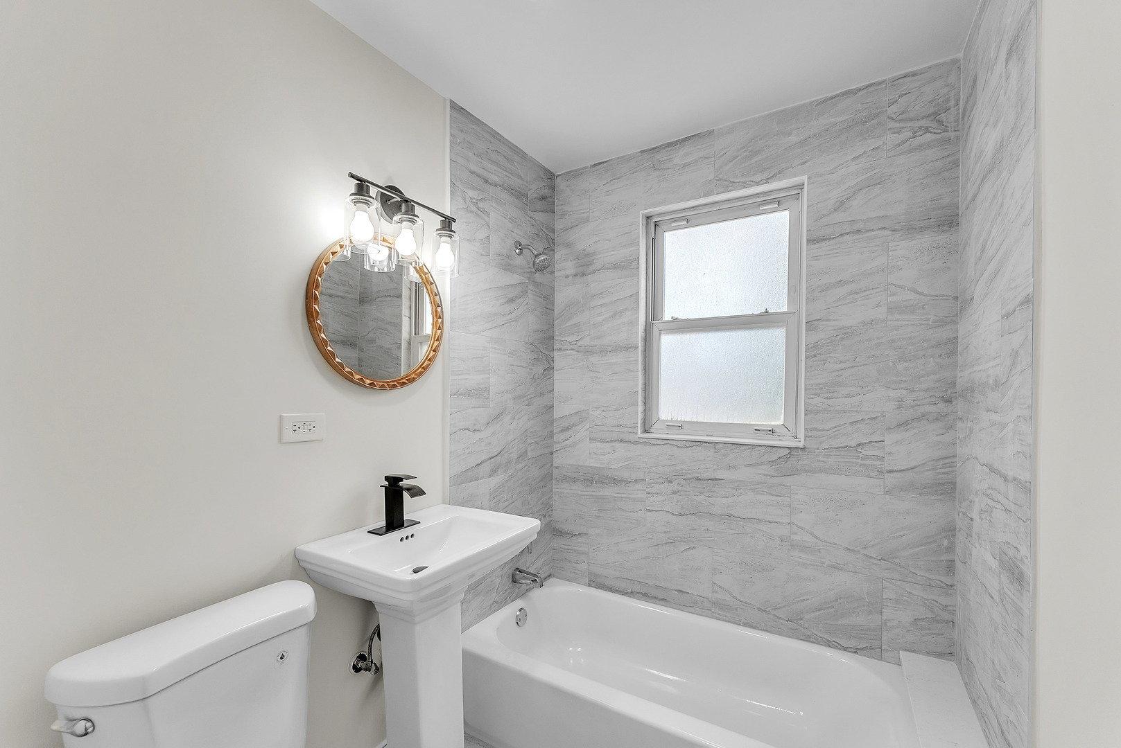 17908 Commercial Avenue Lansing, IL 60438 - Photo 14 of 35 a bathroom with a sink a toilet and a mirror