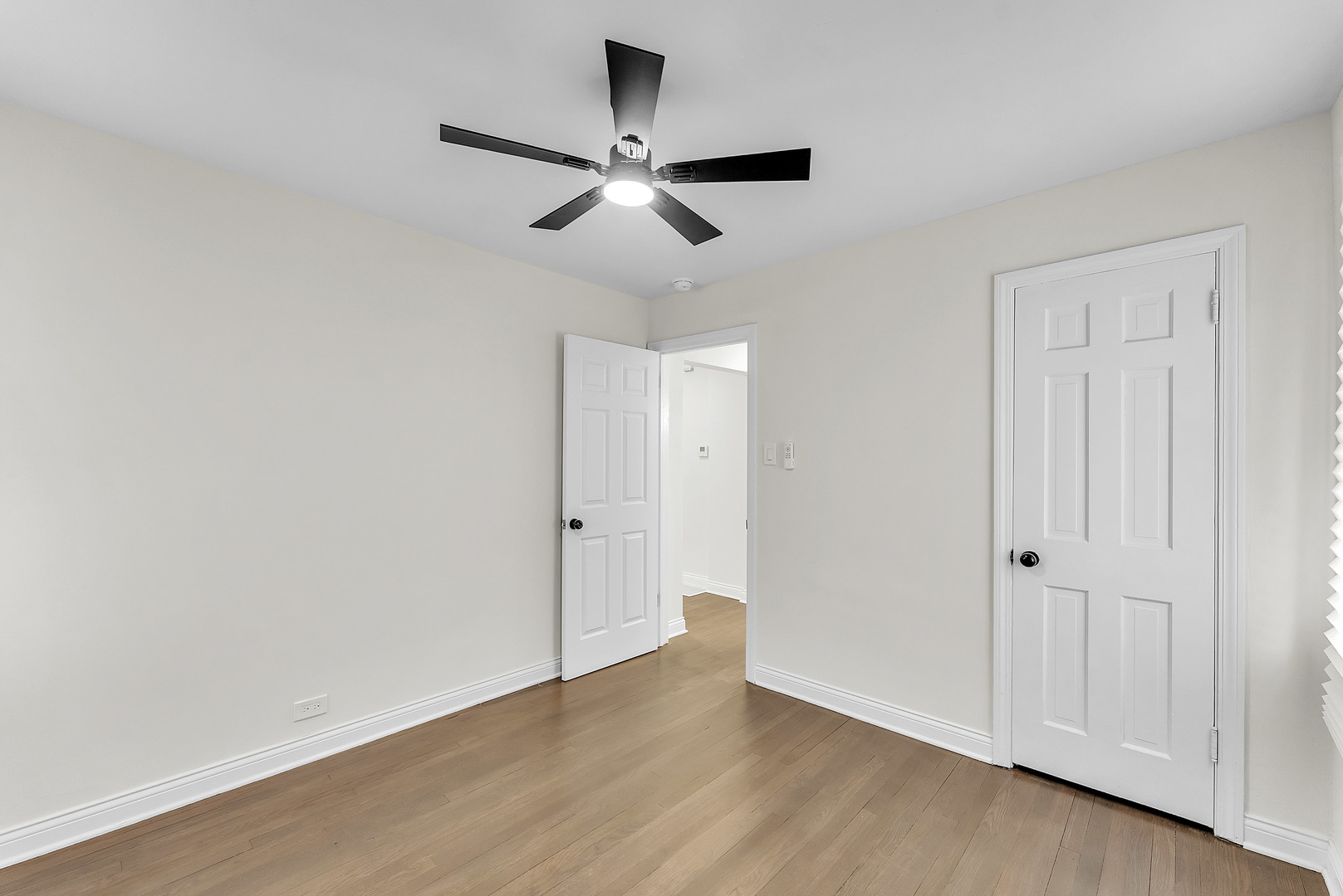 17908 Commercial Avenue Lansing, IL 60438 - Photo 15 of 35 a view of an empty room with wooden floor