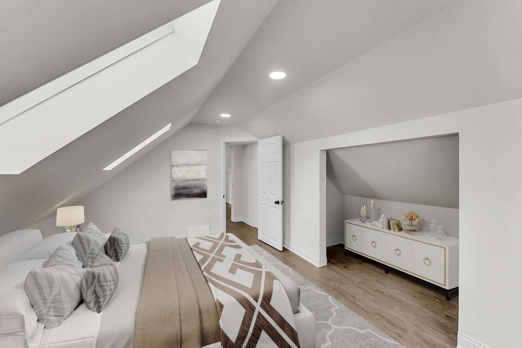 17908 Commercial Avenue Lansing, IL 60438 - Photo 18 of 35 a bedroom with furniture and a window