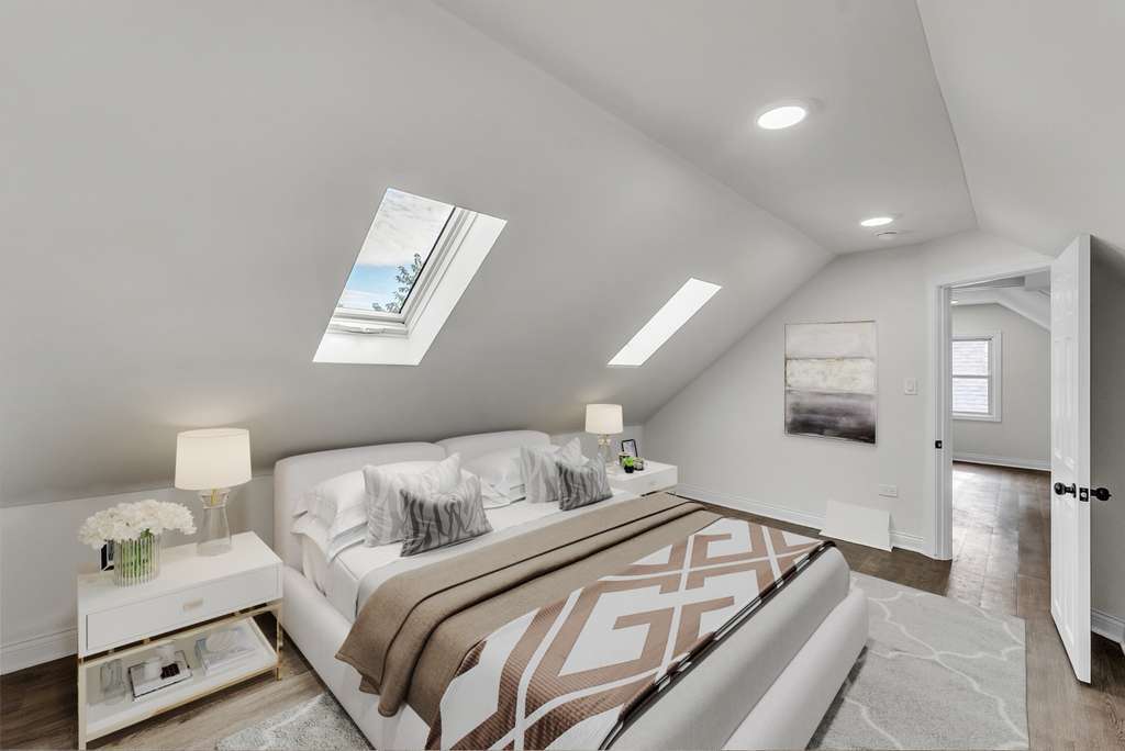 17908 Commercial Avenue Lansing, IL 60438 - Photo 20 of 35 a bedroom with a bed and window