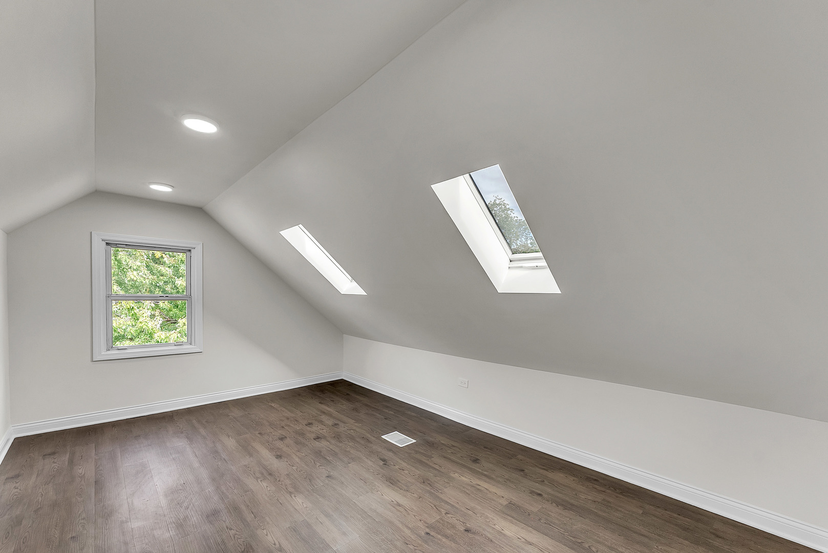 17908 Commercial Avenue Lansing, IL 60438 - Photo 22 of 35 an empty room with wooden floor and windows