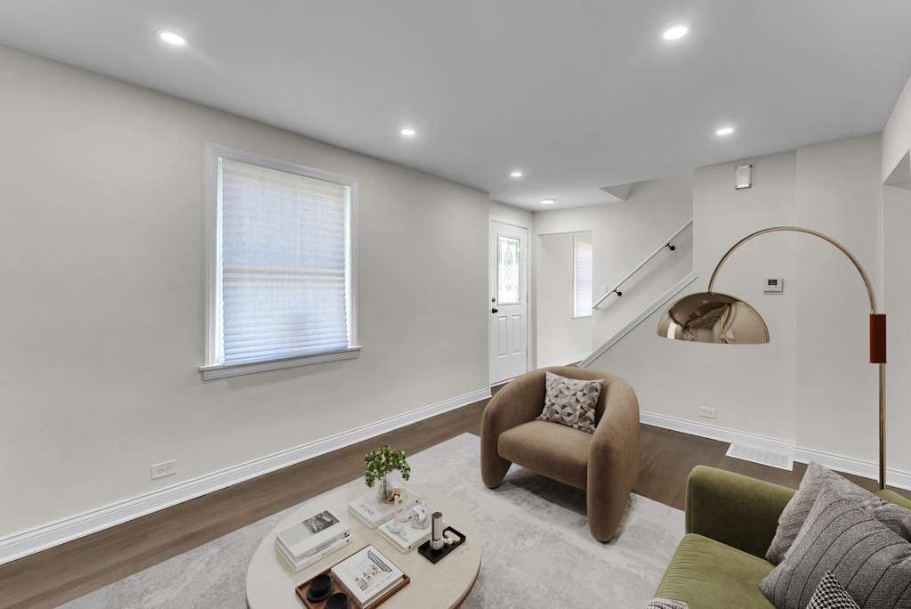 17908 Commercial Avenue Lansing, IL 60438 - Photo 5 of 35 a living room with furniture and a couch