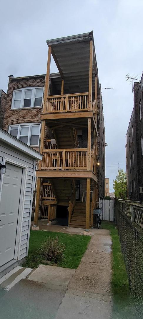10652 South Ave B Chicago, IL 60617 - Photo 17 of 18 a front view of a building