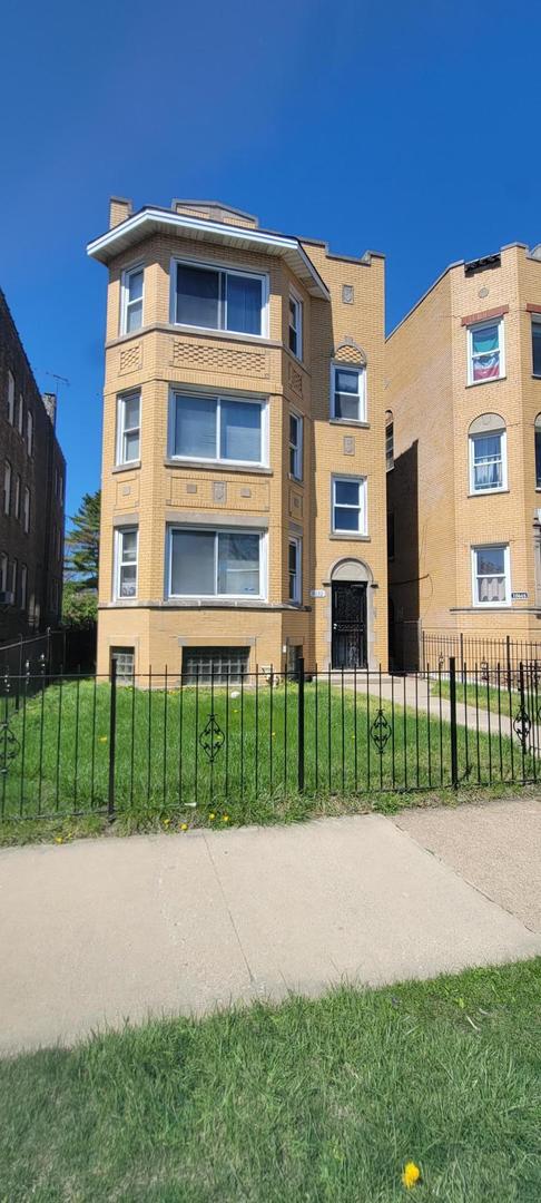 10652 South Ave B Chicago, IL 60617 - Photo 2 of 18 a front view of a building