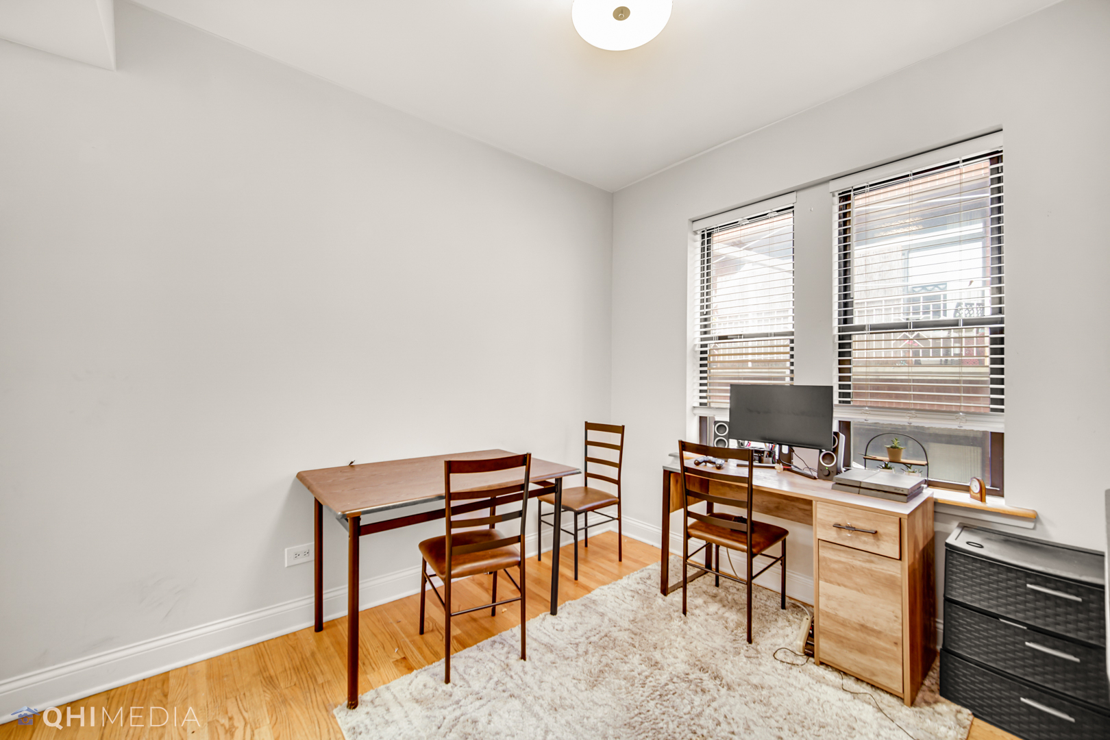 4014 North Spaulding Avenue, Unit 3 Chicago, IL 60618 - Photo 13 of 16 a view of a workspace with furniture