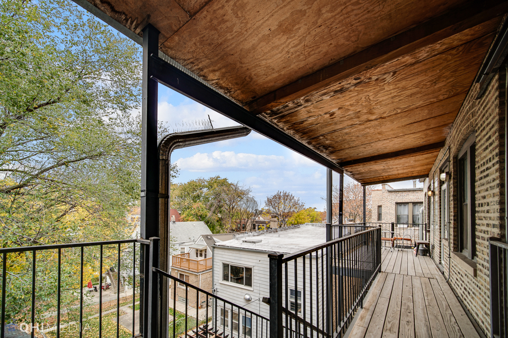 4014 North Spaulding Avenue, Unit 3 Chicago, IL 60618 - Photo 3 of 16 a view of balcony with wooden floor