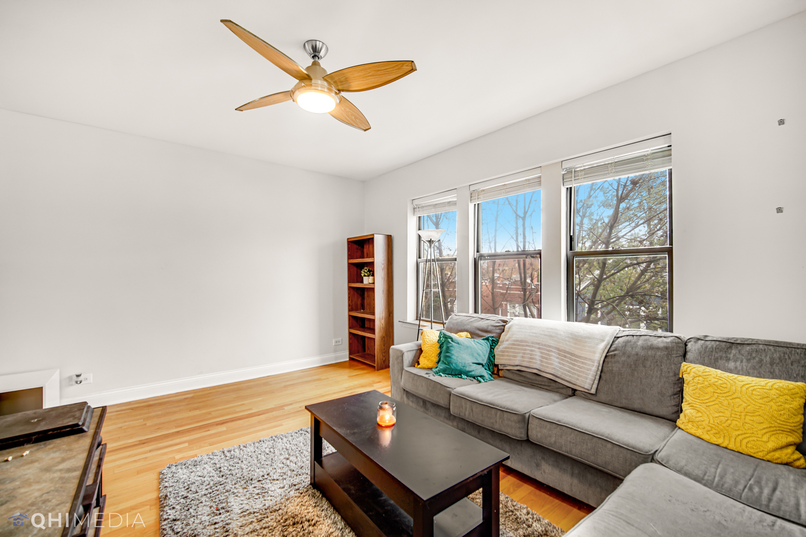 4014 North Spaulding Avenue, Unit 3 Chicago, IL 60618 - Photo 5 of 16 a living room with furniture and a large window