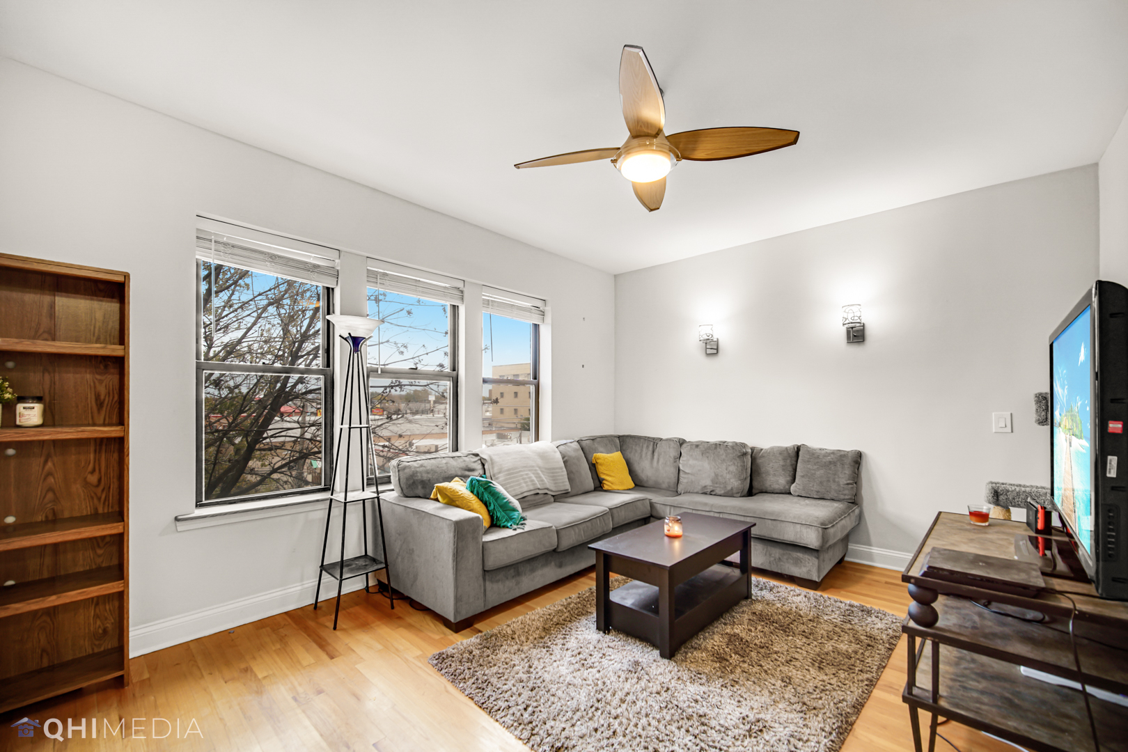 4014 North Spaulding Avenue, Unit 3 Chicago, IL 60618 - Photo 7 of 16 a living room with furniture and a window