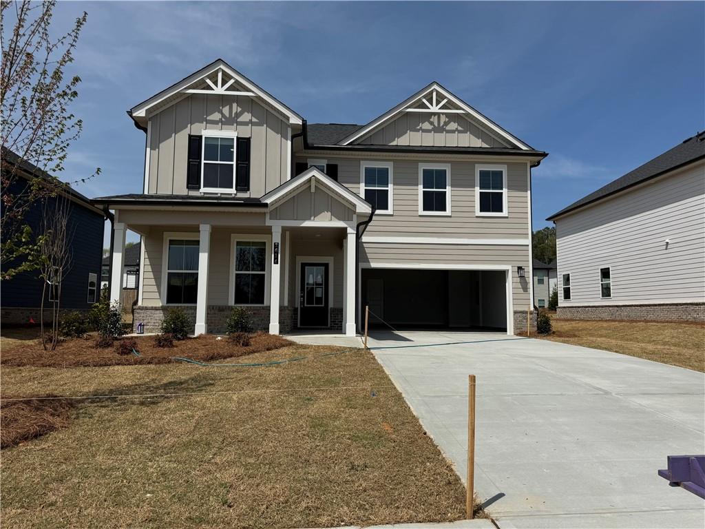 2624 Mourning Dove Drive Grayson, GA 30017 - Photo 1 of 1 a front view of a house with yard