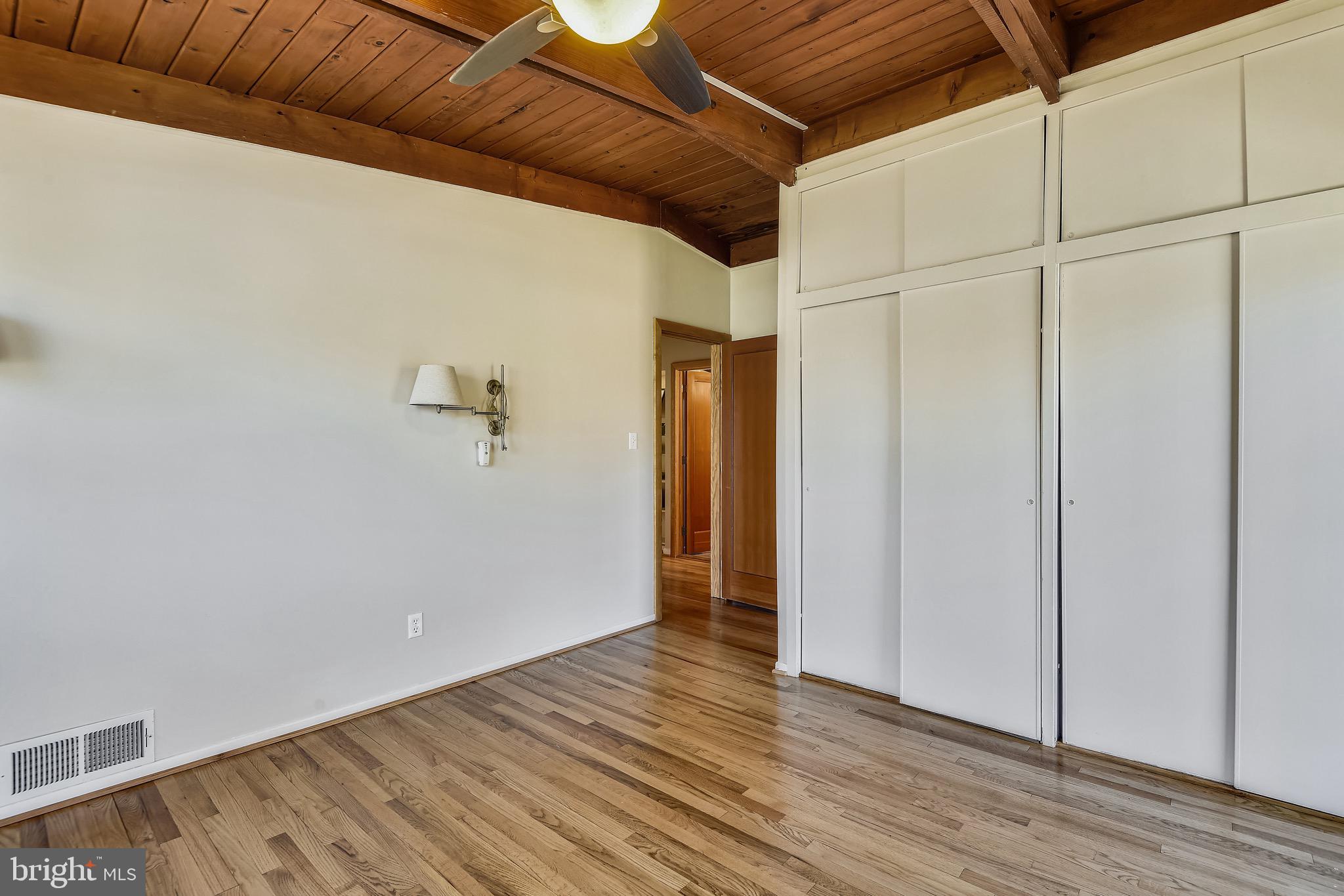 3003 Cedar Hill Road Falls Church, VA 22042 - Photo 14 of 40 Primary bedroom with wall of closets.