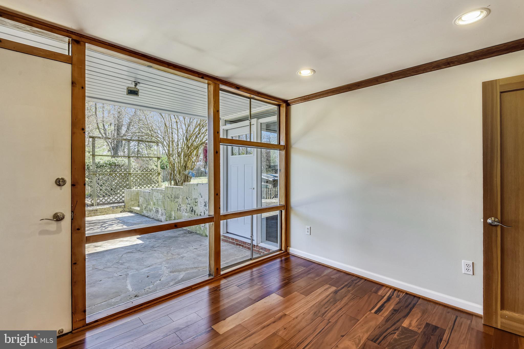 3003 Cedar Hill Road Falls Church, VA 22042 - Photo 22 of 40 Lower level bedroom with view of patio.