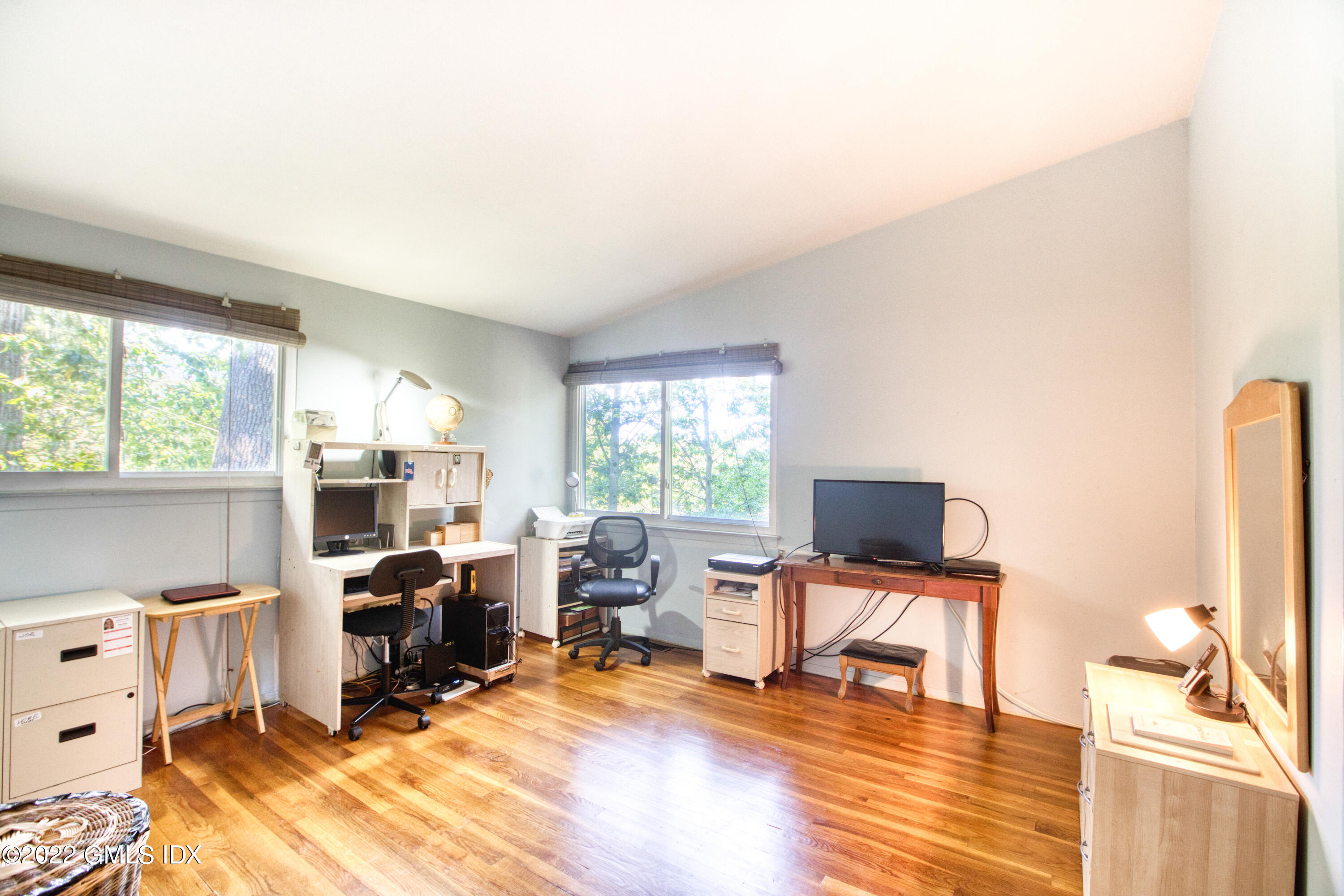 94 Florence Road Riverside, CT 06878 - Photo 11 of 25 a view of a workspace with furniture and a window