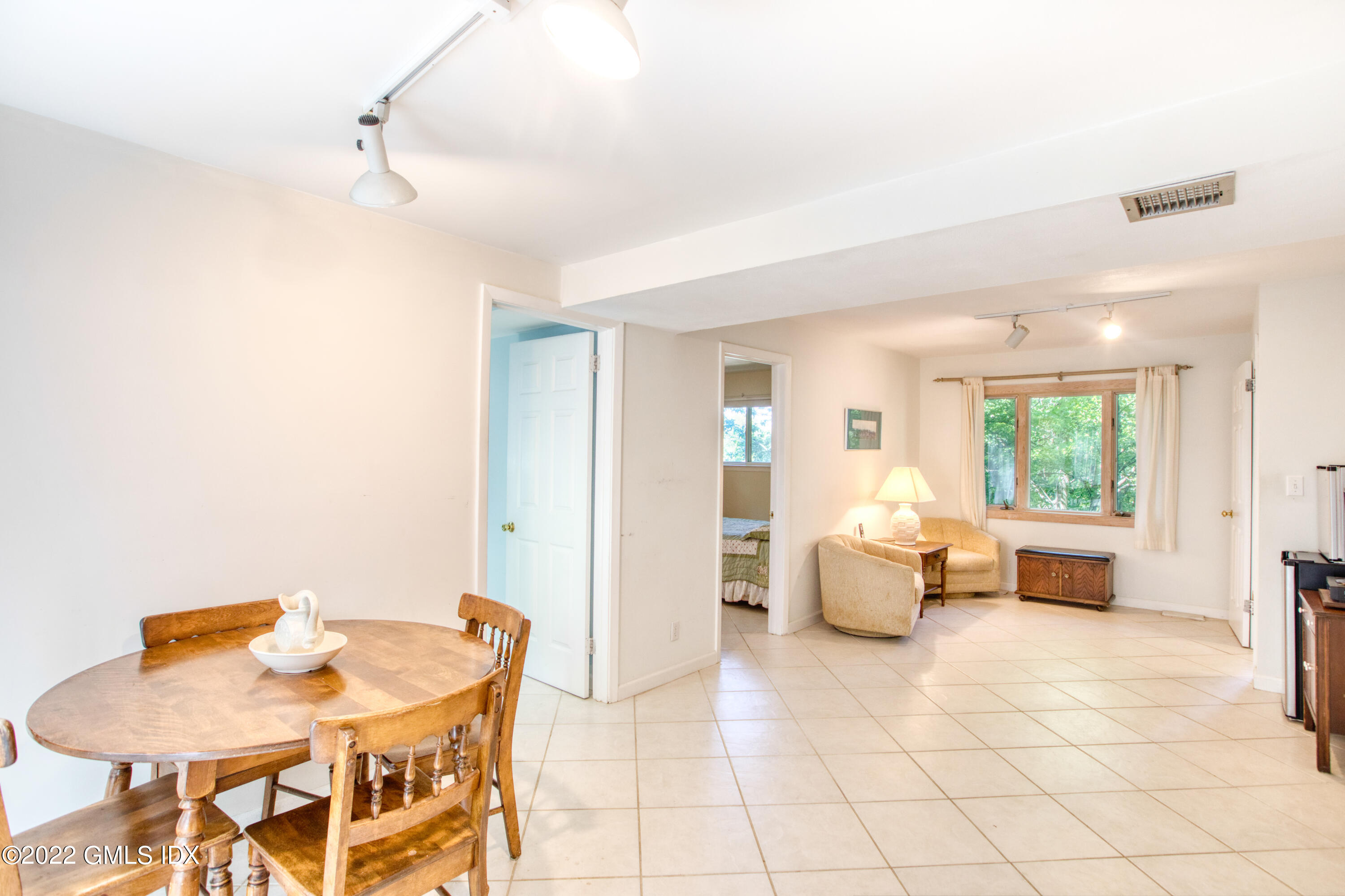 94 Florence Road Riverside, CT 06878 - Photo 13 of 25 a living room with furniture and a table