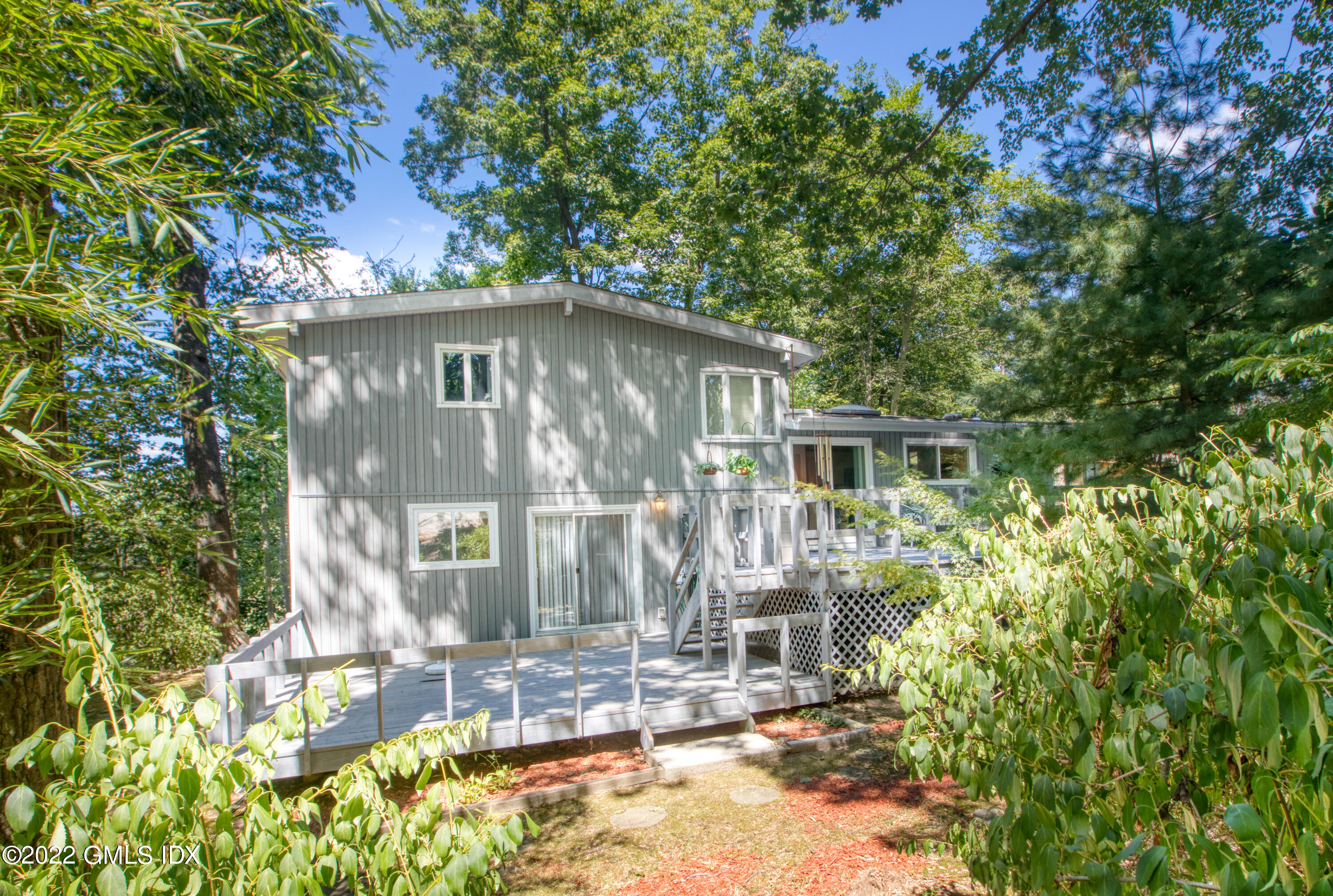 94 Florence Road Riverside, CT 06878 - Photo 19 of 25 a view of house with yard