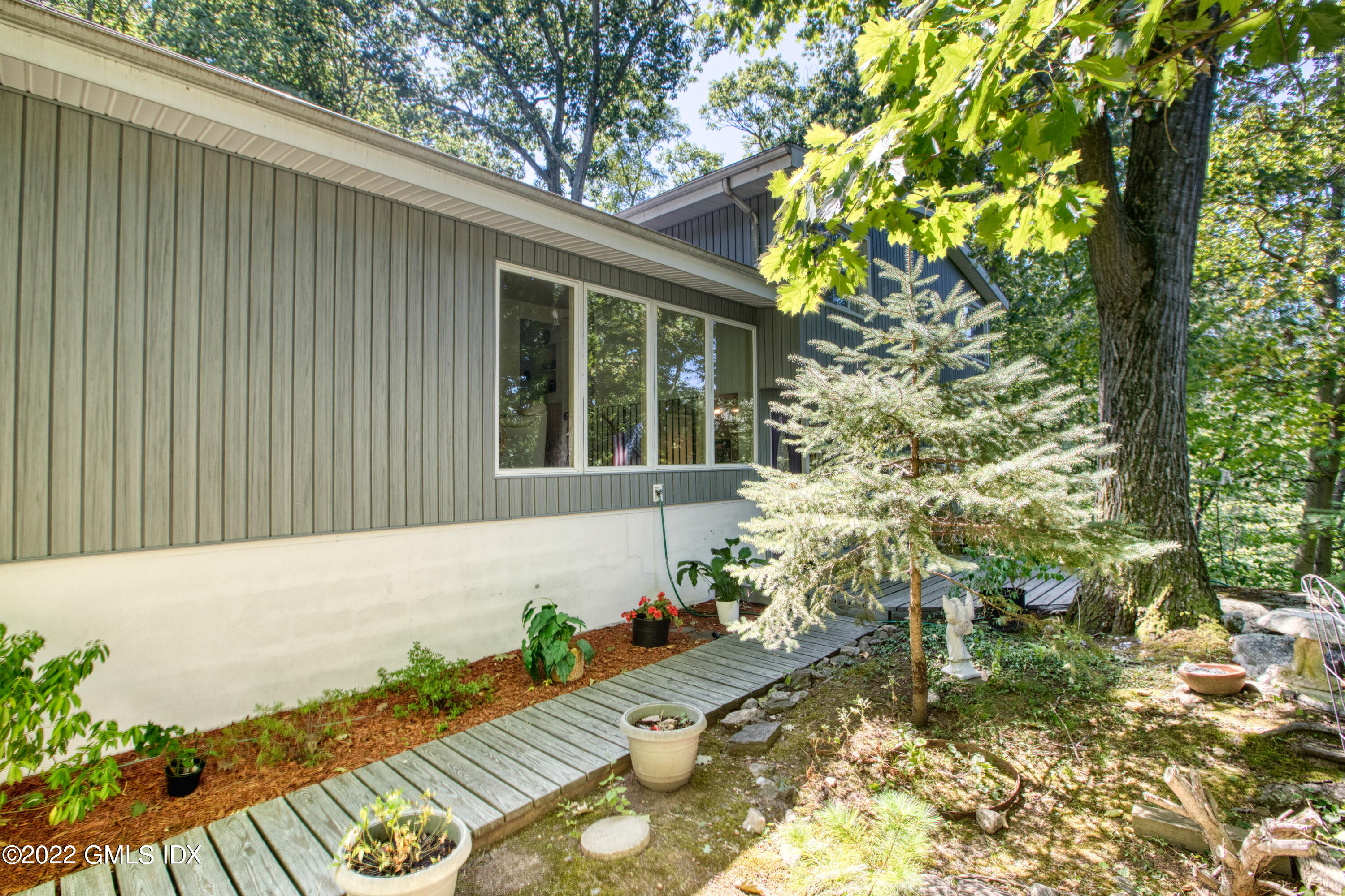 94 Florence Road Riverside, CT 06878 - Photo 20 of 25 a view of yard with seating space
