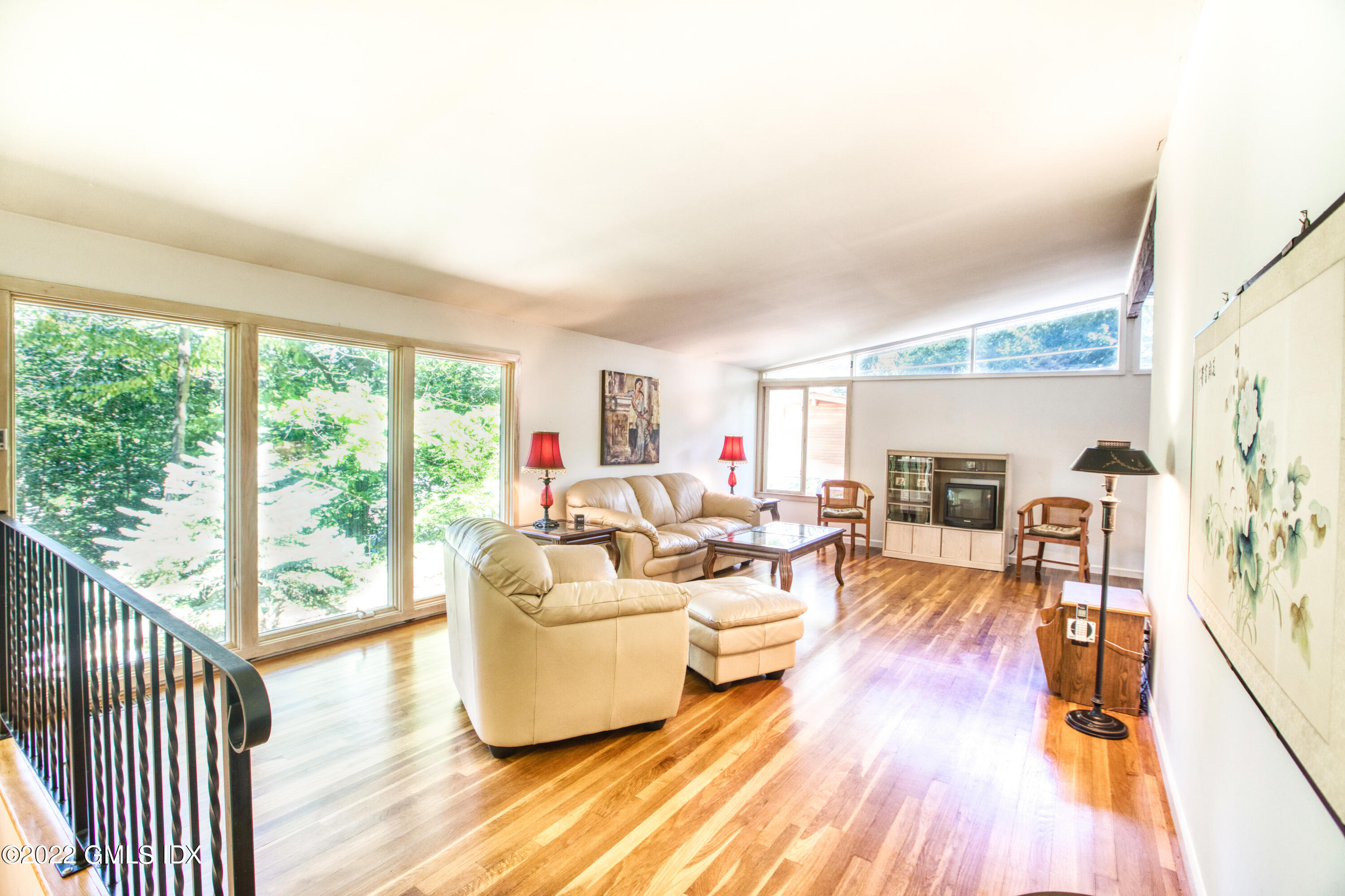 94 Florence Road Riverside, CT 06878 - Photo 3 of 25 a living room with furniture and a large window