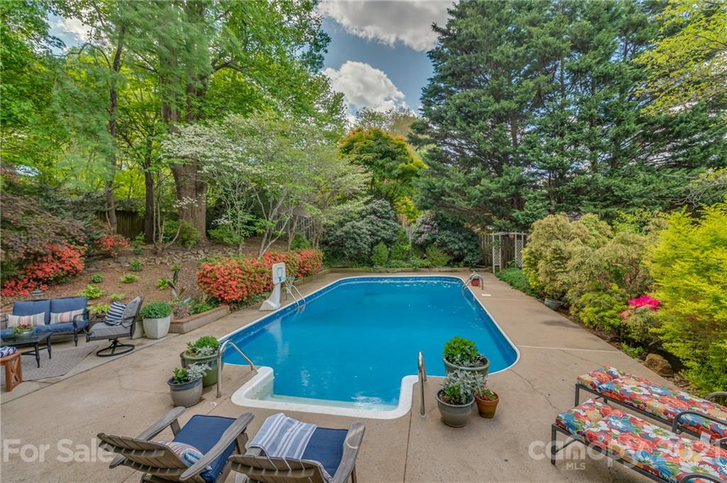 a view of swimming pool from a balcony