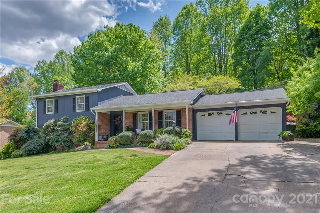137 Anne Street Rutherfordton, NC 28139 - Photo 2 of 45 a front view of house with yard and trees all around
