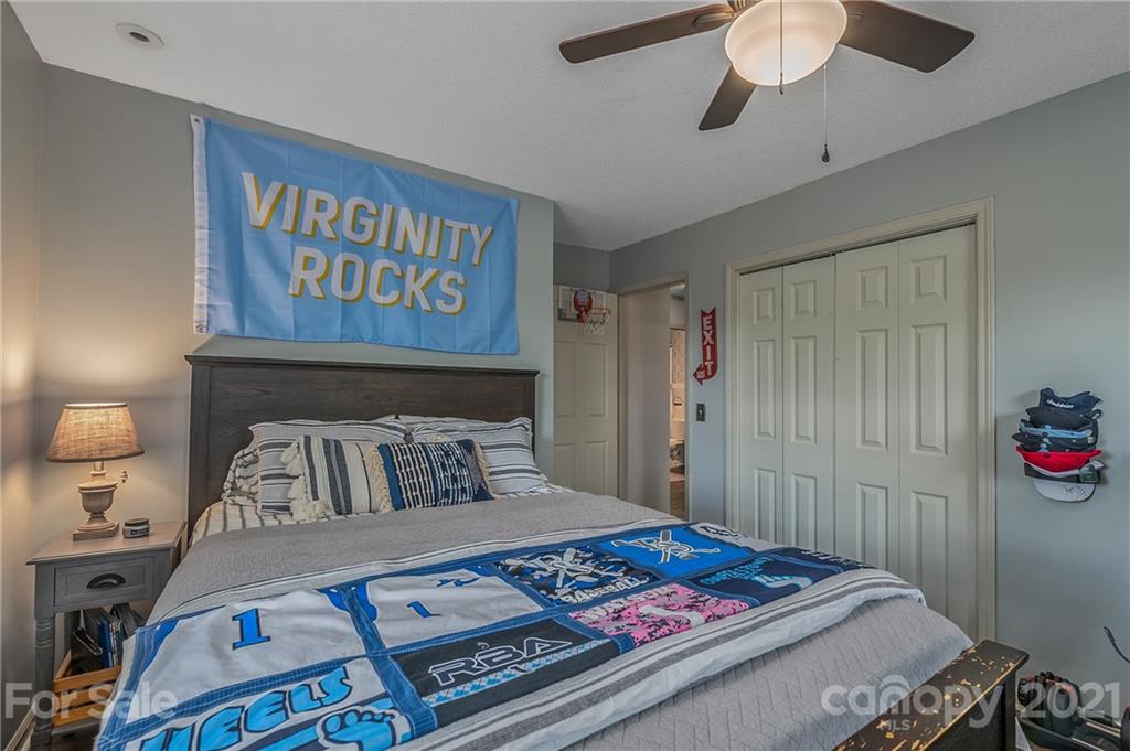 137 Anne Street Rutherfordton, NC 28139 - Photo 12 of 45 a bedroom with a bed and a dresser