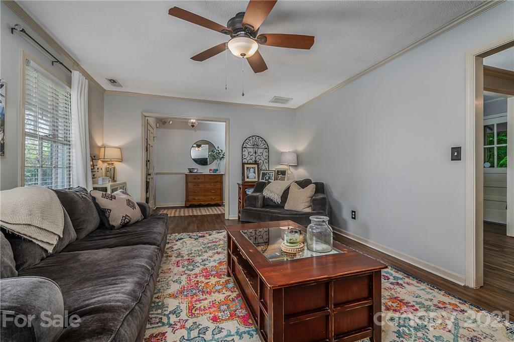 137 Anne Street Rutherfordton, NC 28139 - Photo 18 of 45 a living room with furniture and a wooden floor