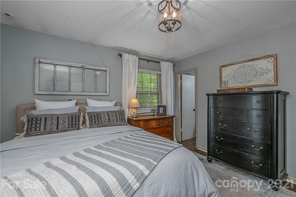 137 Anne Street Rutherfordton, NC 28139 - Photo 22 of 45 a bedroom with a bed and a closet