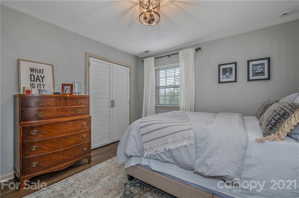 137 Anne Street Rutherfordton, NC 28139 - Photo 23 of 45 a bedroom with a bed and a window