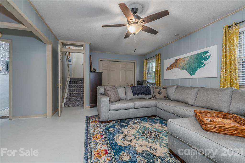 137 Anne Street Rutherfordton, NC 28139 - Photo 25 of 45 a living room with furniture and a large window