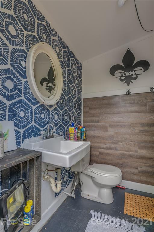 137 Anne Street Rutherfordton, NC 28139 - Photo 28 of 45 a bathroom with a toilet and a sink