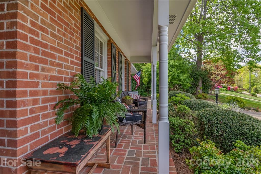 137 Anne Street Rutherfordton, NC 28139 - Photo 33 of 45 a view of a backyard with plants and outdoor seating