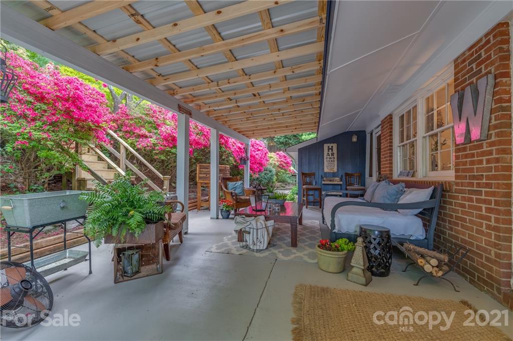 137 Anne Street Rutherfordton, NC 28139 - Photo 35 of 45 a view of patio with a table and chairs and potted plants